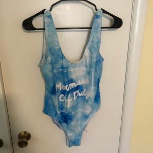 One piece bathing suit: mermaid off duty